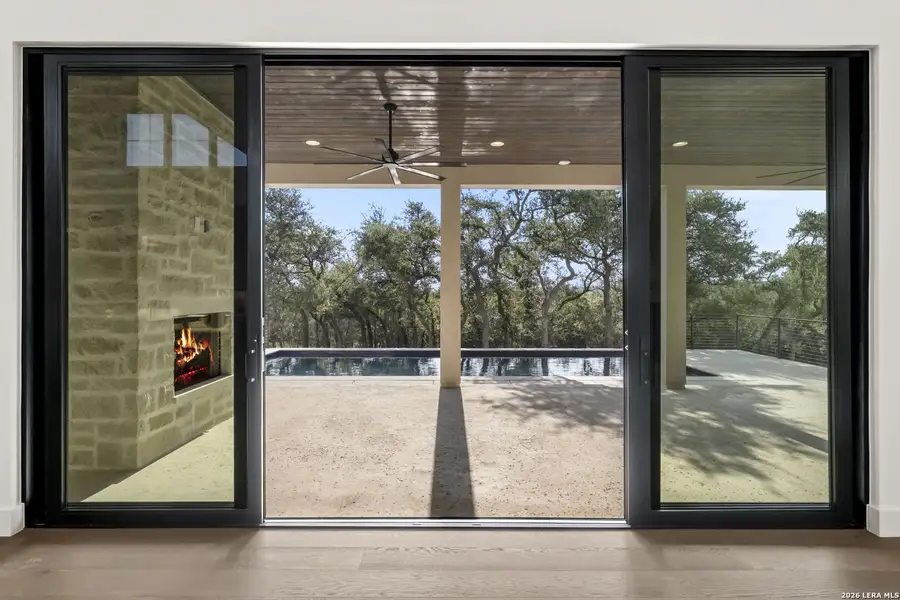 Exterior details and patio area of a home in , Spring Branch (Image 27).