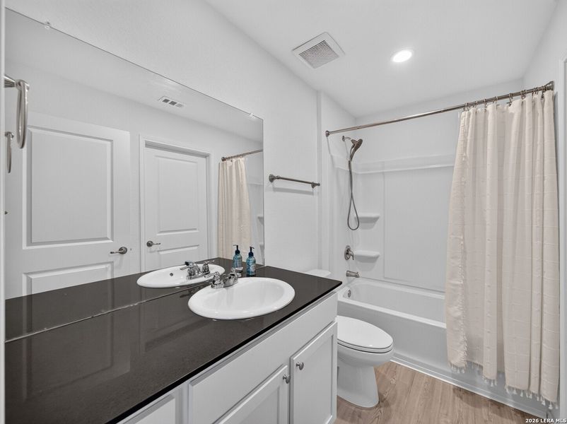 Furnished interior view inside a new home in Mission del Lago, San Antonio (Image 8).