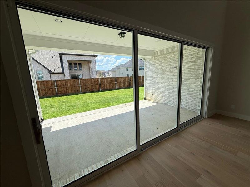Entryway featuring wood finished floors and a residential view Entryway featuring wood finished floors and a residential view