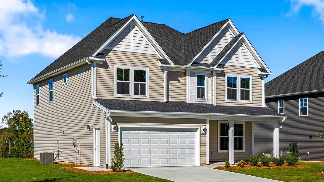 Front exterior of a new home in Fieldstone, Lexington, NC, highlighting curb appeal (Image 2).
