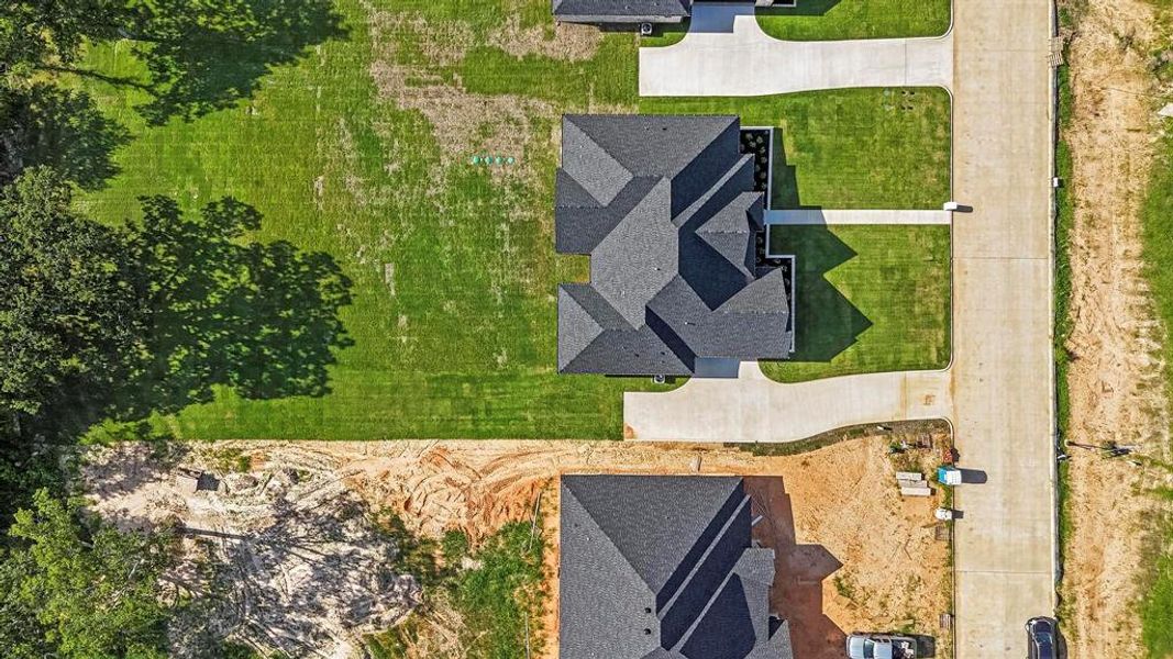 Front exterior of a new home in , Tyler, TX, highlighting curb appeal (Image 18). Front exterior of a new home in , Tyler, TX, highlighting curb appeal (Image 18).
