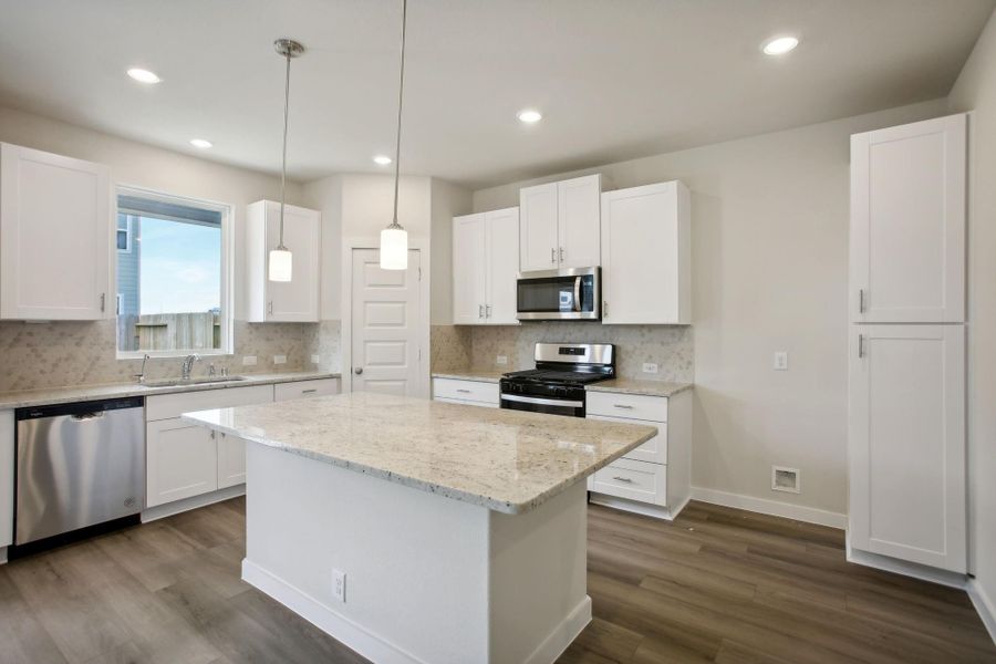 Photo is not of the actual home, but is an inspirational photo of builder’s model home and may depict options, furnishings, and/or decorator features that are not included