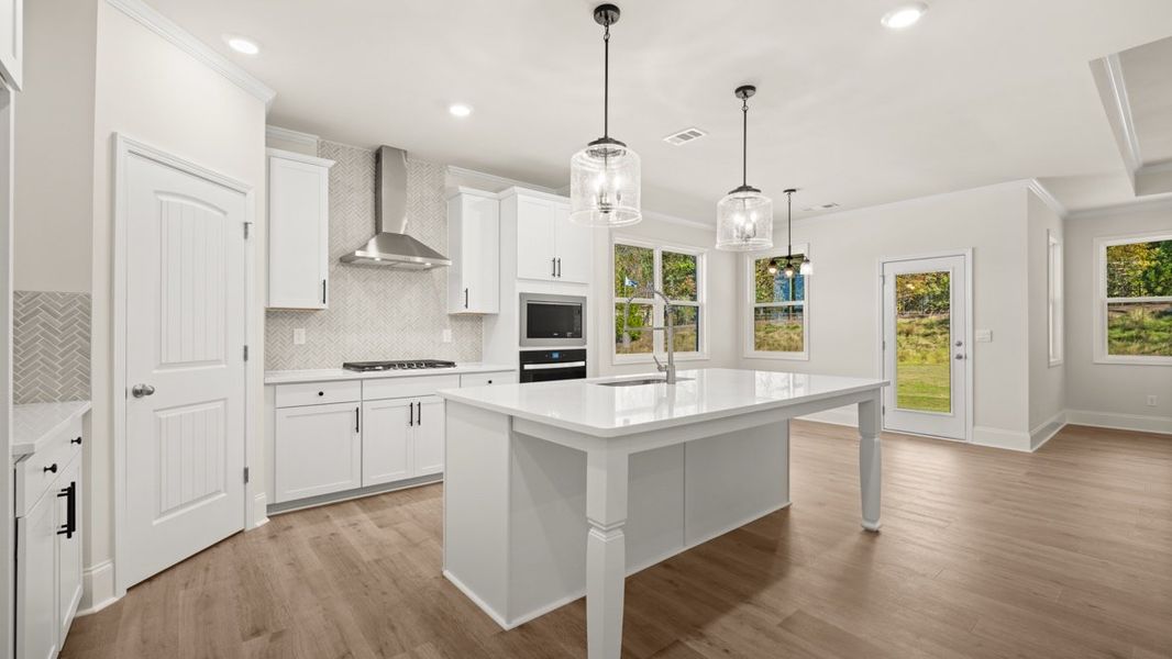 Representative furnished interior of a home built from the WINDSOR by D.R. Horton in Butner Estates, South Fulton (Image 6).