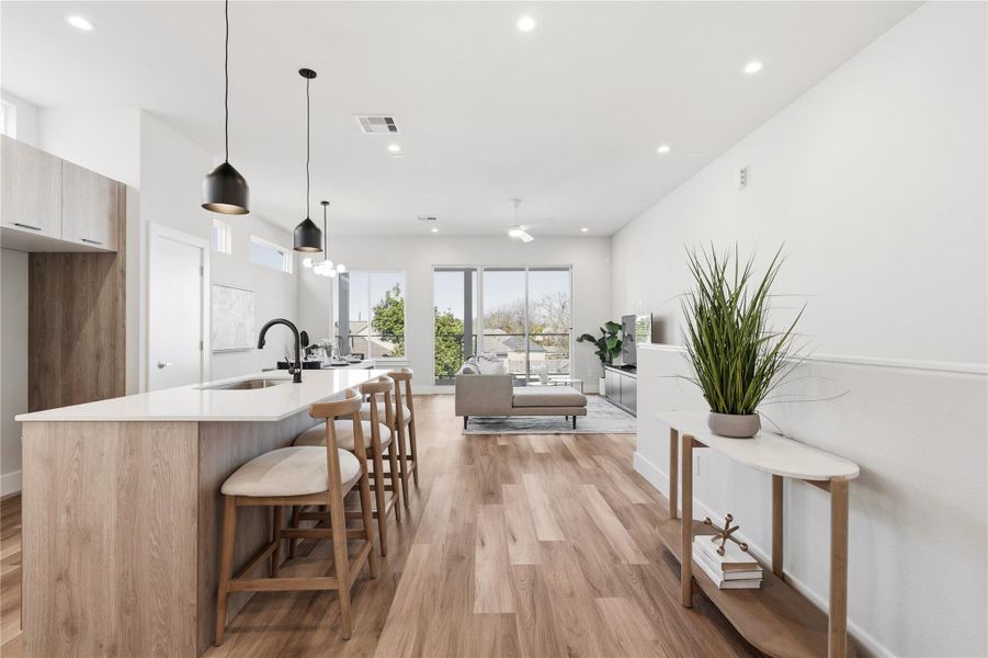 A quiet morning view from the primary suite, looking out across the main living level, open, light-filled, and intentionally separated from the rest of the home.