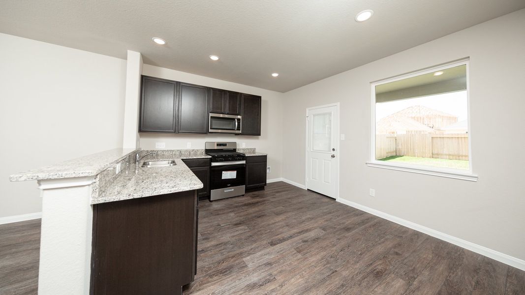 Kitchen and Dining Area Kitchen and Dining Area