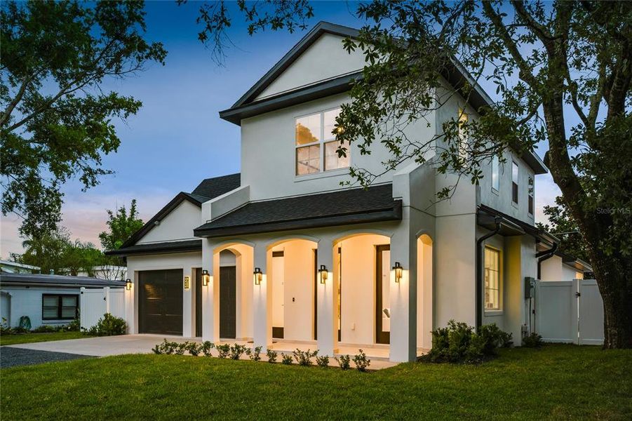 Front exterior of a new home in , Winter Park, FL, highlighting curb appeal (Image 26).