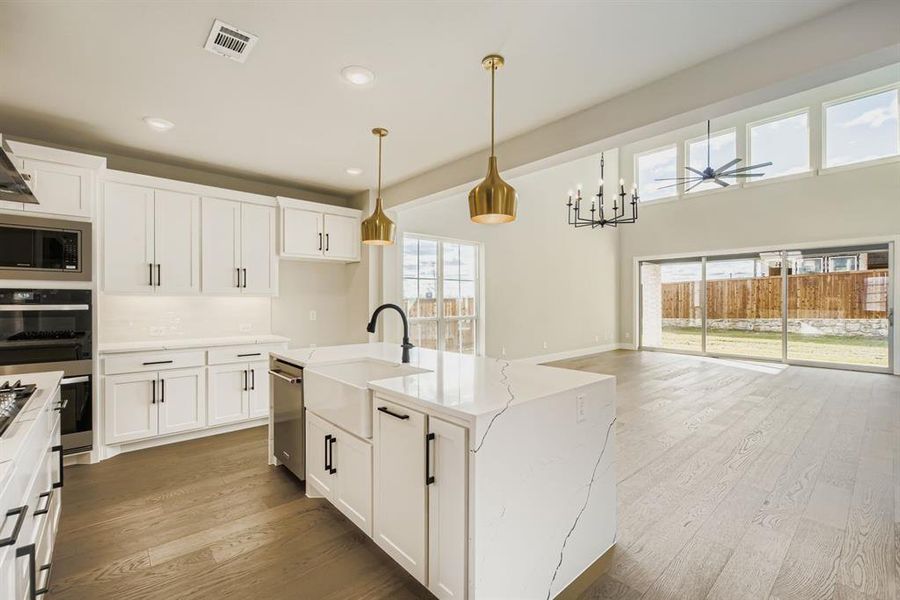 Furnished interior view inside a new home in Wildridge, Oak Point (Image 11).