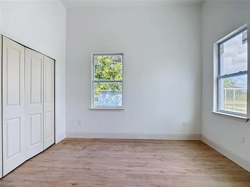 Spacious, unfurnished interior of a new home in , Port Charlotte (Image 28).