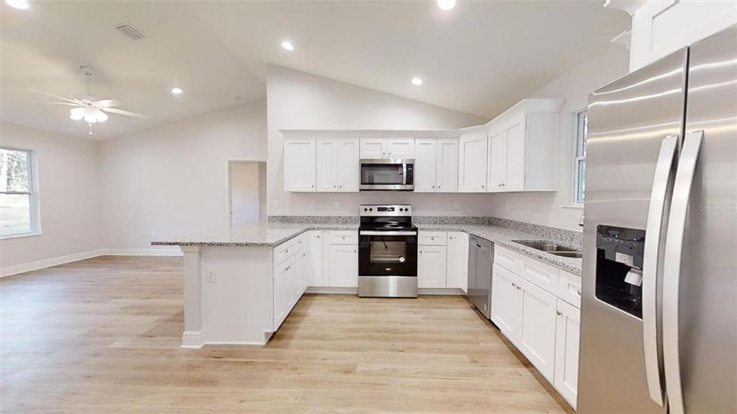 Furnished interior view inside a new home in , Dunnellon (Image 7).
