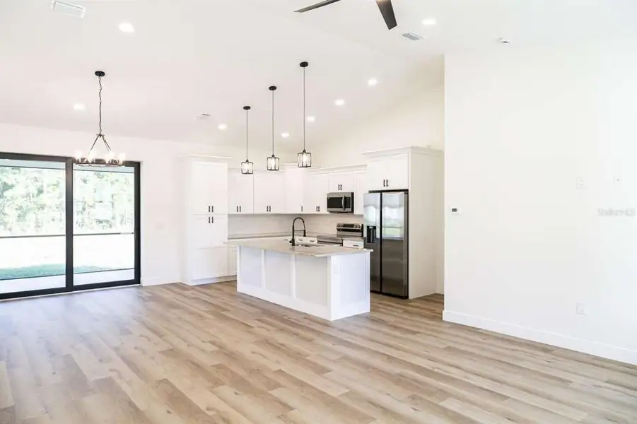 Furnished interior view inside a new home in , North Port (Image 16).
