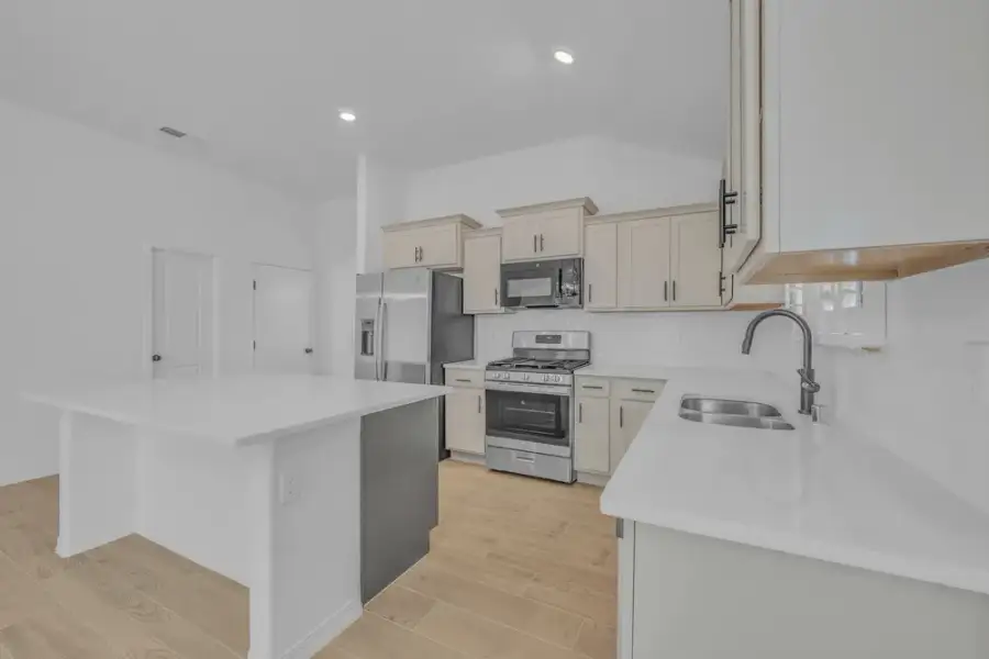 Furnished interior view inside a new home in Crossland, Clint (Image 12).