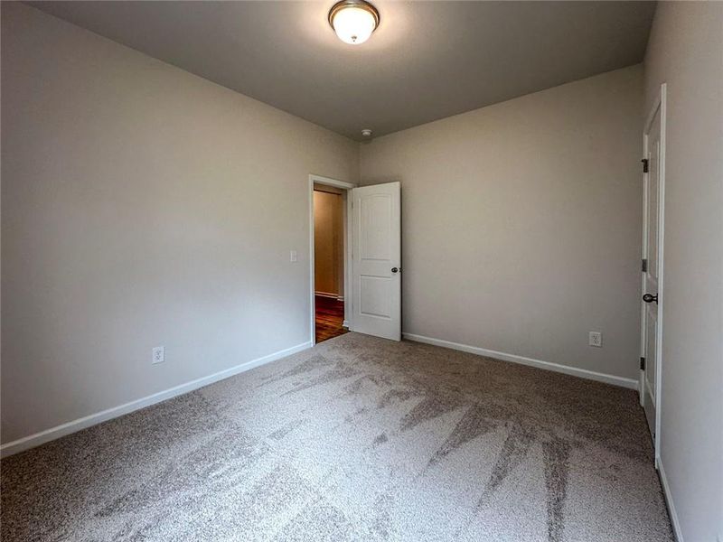 Spacious, unfurnished interior of a new home in Glen at Cave Springs, Douglasville (Image 13).