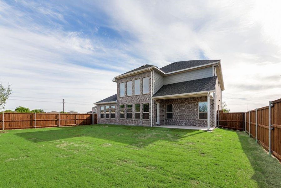 Exterior details and patio area of a home in Villages of Creekwood, Frisco (Image 3). Exterior details and patio area of a home in Villages of Creekwood, Frisco (Image 3).
