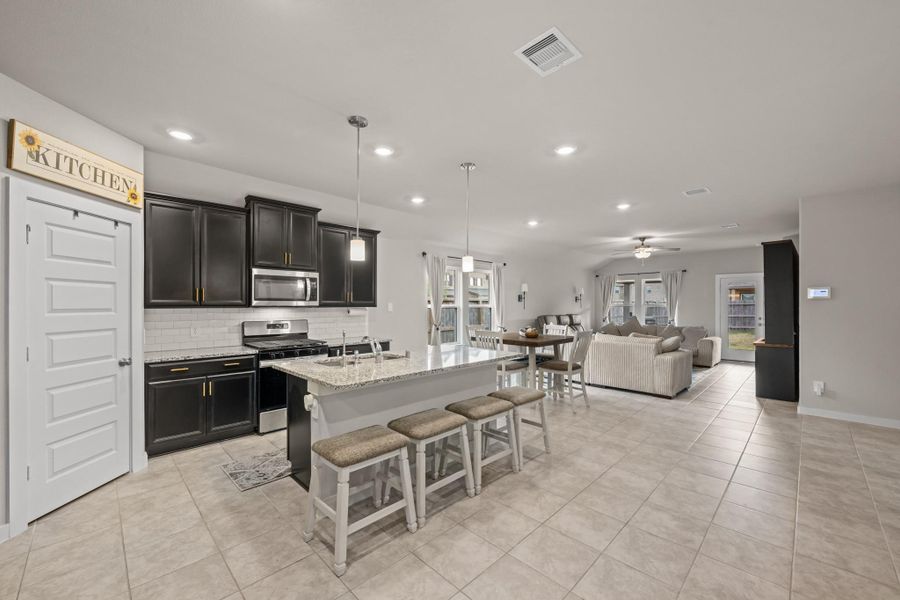 Furnished interior view inside a new home in Sierra Vista, Iowa Colony (Image 28).