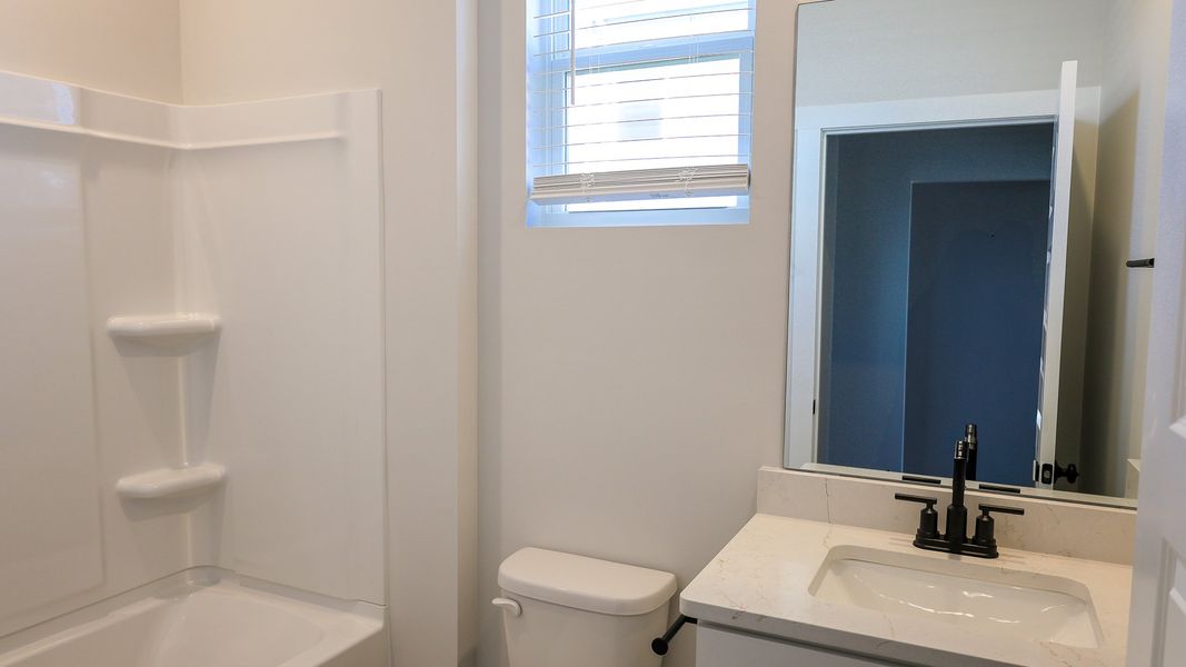 Furnished interior view inside a new home in Nexus South, Gallatin (Image 31).