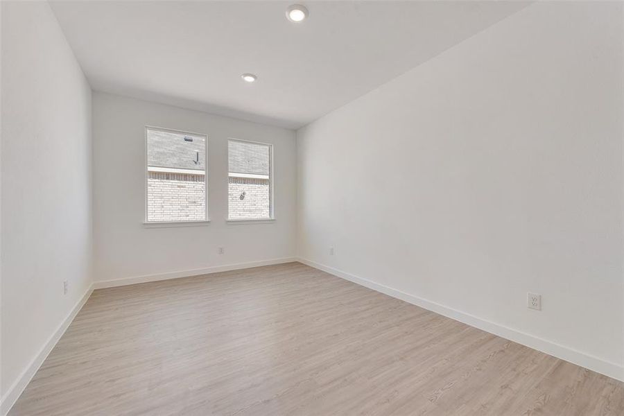 Unfurnished room featuring light hardwood / wood-style floors