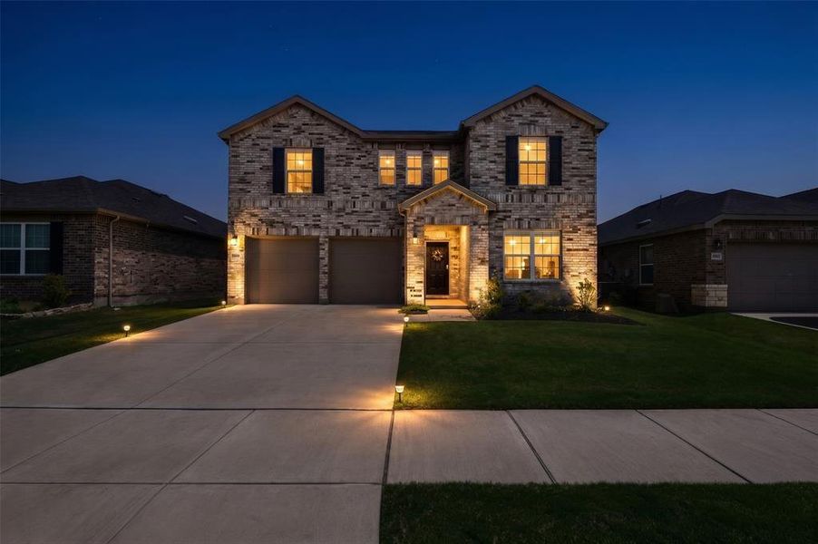 Front exterior of a new home in , Denton, TX, highlighting curb appeal (Image 28). Front exterior of a new home in , Denton, TX, highlighting curb appeal (Image 28).