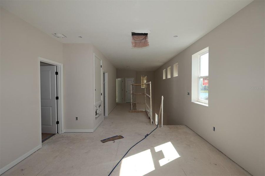 In-progress construction of a new home in Center Lake on the Park, St. Cloud, FL (Image 18).