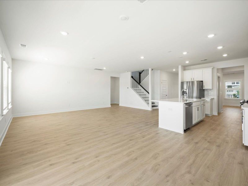 Spacious, unfurnished interior of a new home in The Coves at Lakes of Cane Bay, Summerville (Image 20).