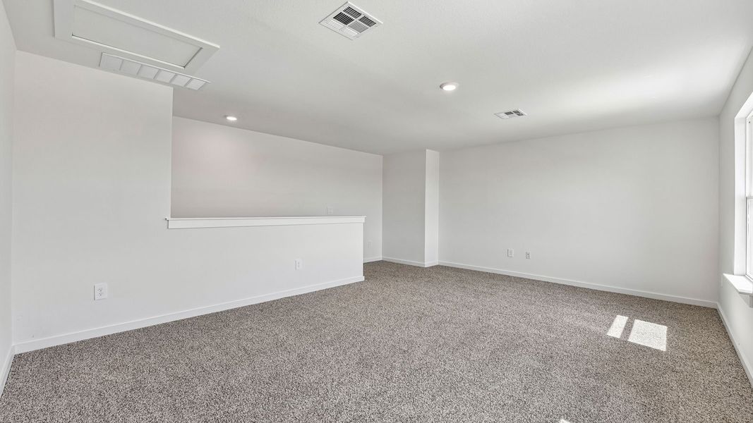 Spacious, unfurnished interior of a new home in Monarch Ranch, Manor (Image 33).