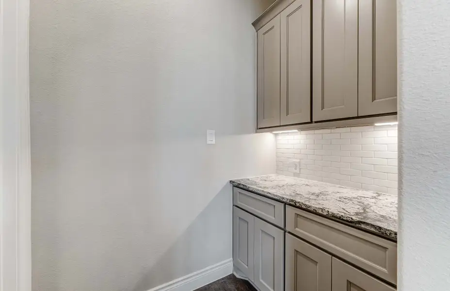 Representative furnished interior of a home built from the 3798 by Ravenna Homes in The Woodlands Hills 65′, Willis (Image 12).