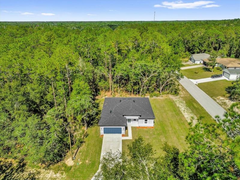 Front exterior of a new home in , Citrus Springs, FL, highlighting curb appeal (Image 22).