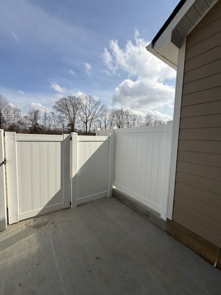 Exterior details and patio area of a home in Legacy Fields, Pleasant View (Image 4).