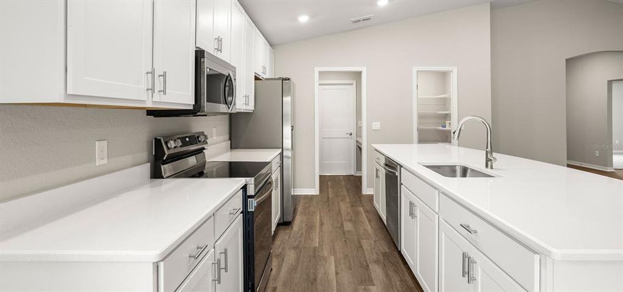 Furnished interior view inside a new home in The Crossings - Single-Family Homes, St. Cloud (Image 7).
