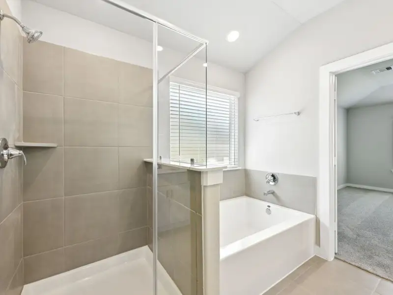 Furnished interior view inside a new home in Pine Lake Cove - Premier Series, Montgomery (Image 10).