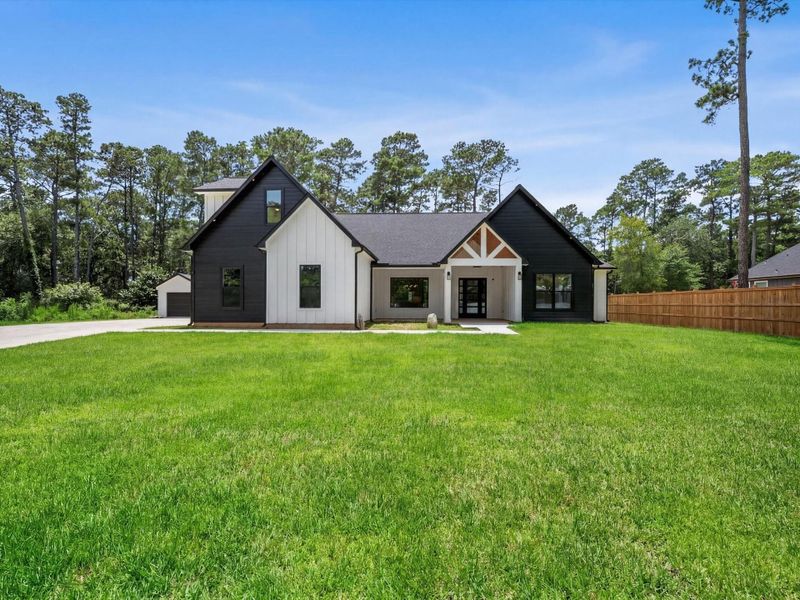 Front exterior of a new home in , Hockley, TX, highlighting curb appeal (Image 27).