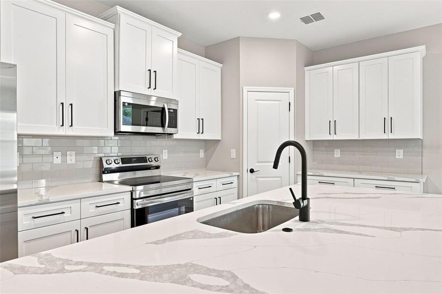 Furnished interior view inside a new home in , North Port (Image 13).