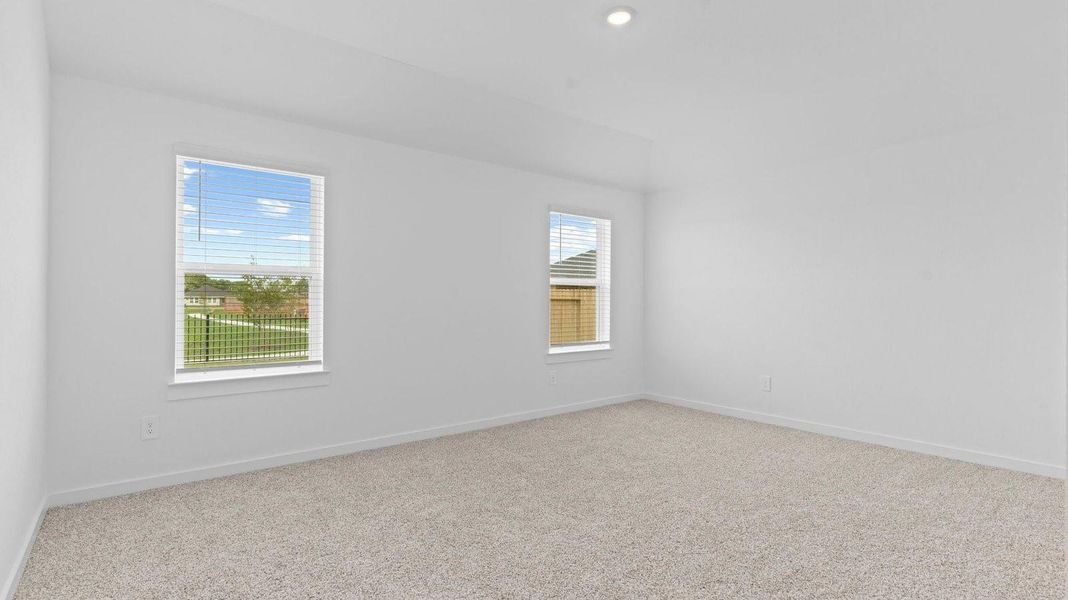 Spacious, unfurnished interior of a new home in Caldwell Crossing, Iowa Colony (Image 11).