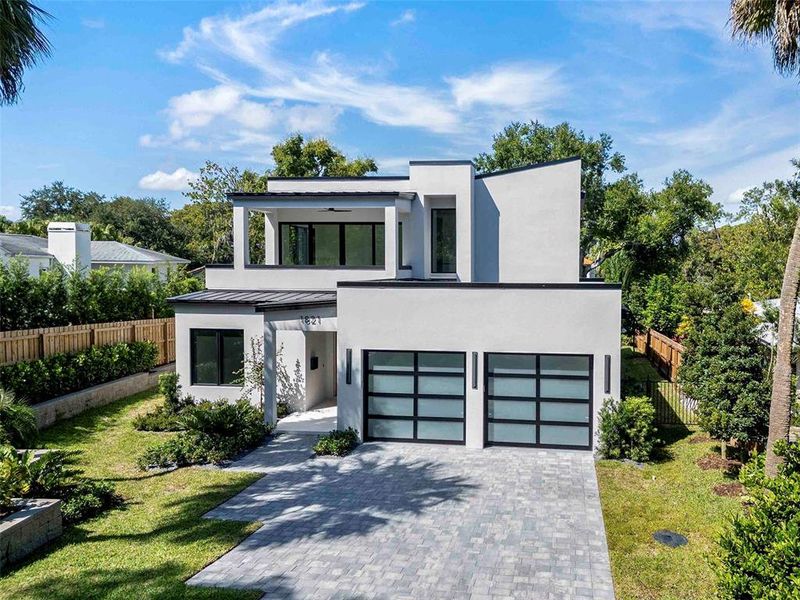 Front exterior of a new home in , Winter Park, FL, highlighting curb appeal (Image 20). Front exterior of a new home in , Winter Park, FL, highlighting curb appeal (Image 20).