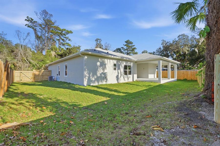 Exterior details and patio area of a home in , New Smyrna Beach (Image 34).