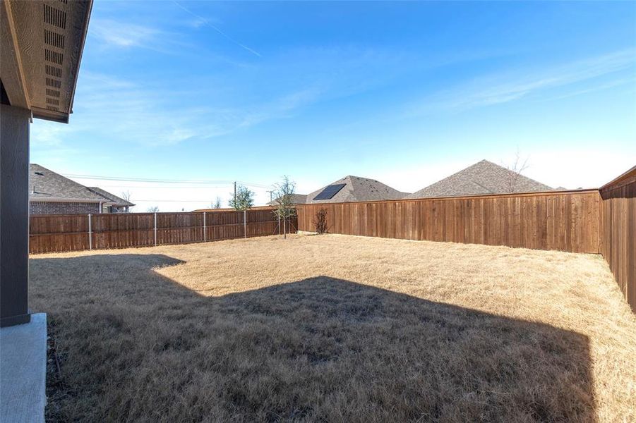 Exterior details and patio area of a home in Light Farms - Sweetwater, Celina (Image 4).