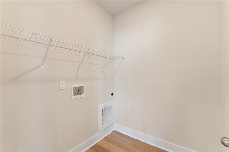 A well-appointed utility room features a wire shel