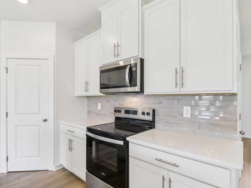 Furnished interior view inside a new home in Cedarcrest Townhomes, Fairview (Image 4).
