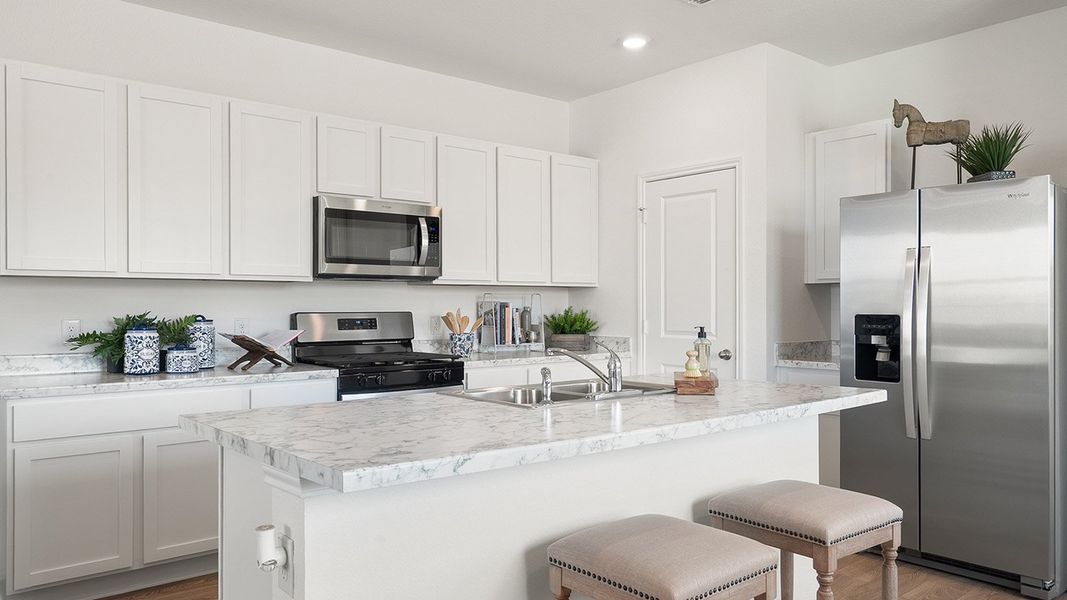 Representative furnished interior of a home built from the The Lyndon by D.R. Horton in Valverde, Bastrop (Image 10). Representative furnished interior of a home built from the The Lyndon by D.R. Horton in Valverde, Bastrop (Image 10).