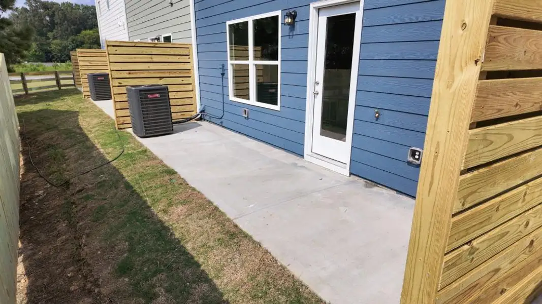 Front exterior of a new home in Sterling At The Villages, Calhoun, GA, highlighting curb appeal (Image 15).