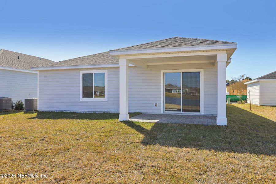 Exterior details and patio area of a home in Colbert Landings, Palm Coast (Image 3).