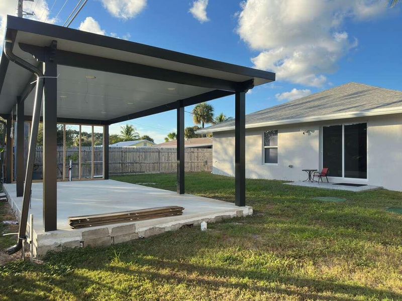 Exterior details and patio area of a home in , West Palm Beach (Image 2). Exterior details and patio area of a home in , West Palm Beach (Image 2).