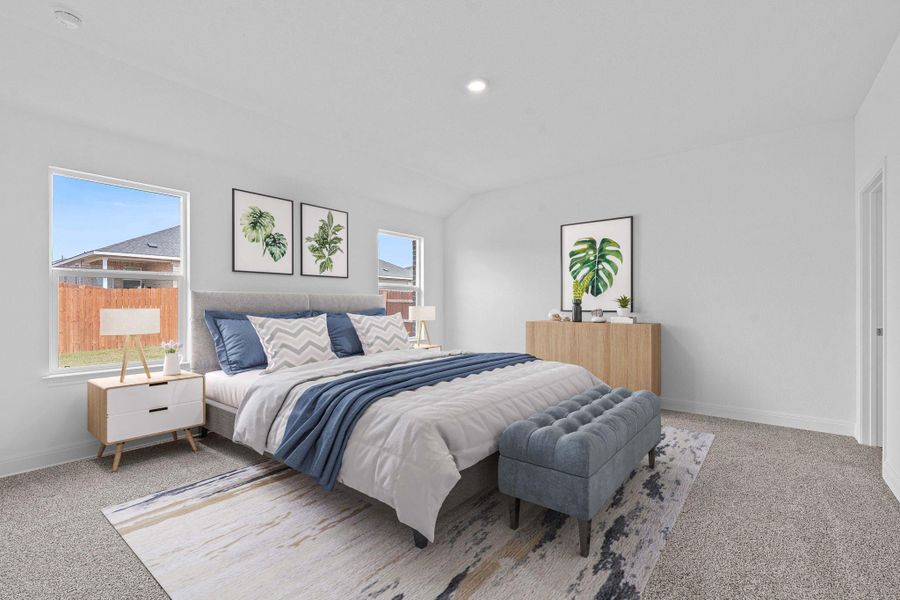 Bedroom with carpet floors, vaulted ceiling, and recessed lighting Bedroom with carpet floors, vaulted ceiling, and recessed lighting