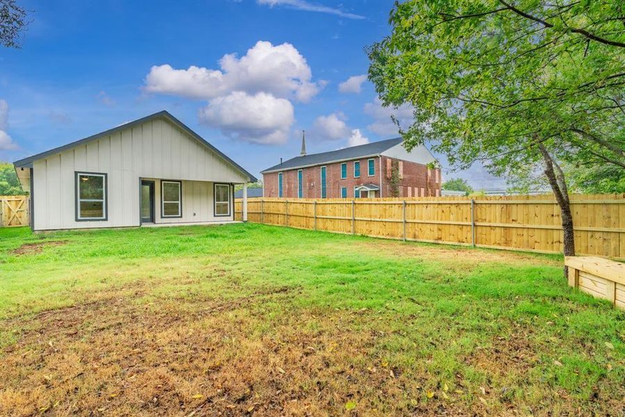 Front exterior of a new home in , Greenville, TX, highlighting curb appeal (Image 20). Front exterior of a new home in , Greenville, TX, highlighting curb appeal (Image 20).