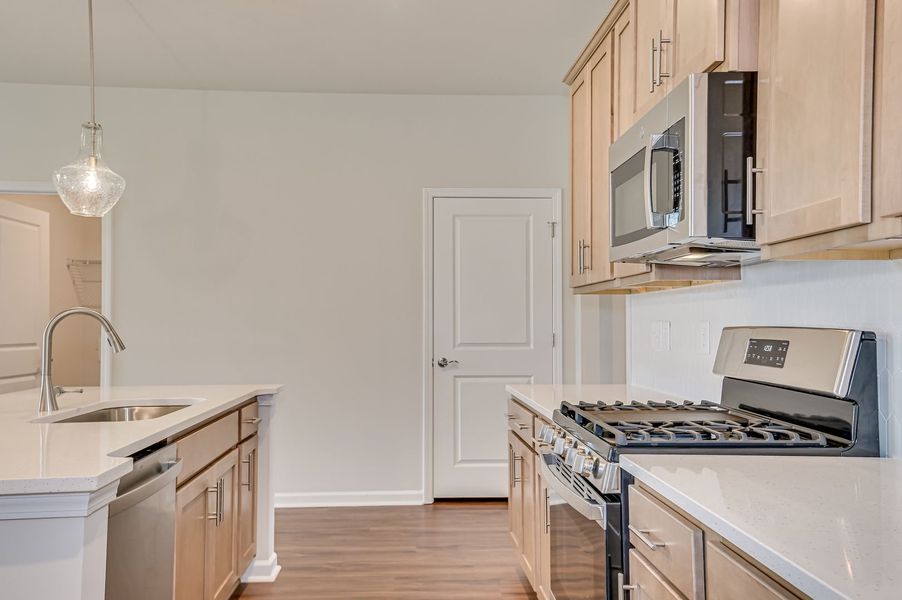 Furnished interior view inside a new home in The Beacon at Old Peachtree Single Family Homes, Lawrenceville (Image 14).