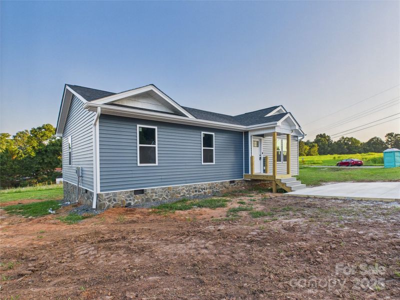 Front exterior of a new home in , Hudson, NC, highlighting curb appeal (Image 1). Front exterior of a new home in , Hudson, NC, highlighting curb appeal (Image 1).