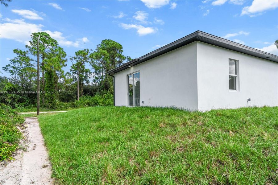 Exterior details and patio area of a home in , Lehigh Acres (Image 24).