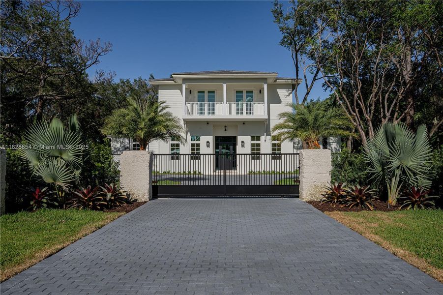 Front exterior of a new home in , Miami, FL, highlighting curb appeal (Image 1). Front exterior of a new home in , Miami, FL, highlighting curb appeal (Image 1).