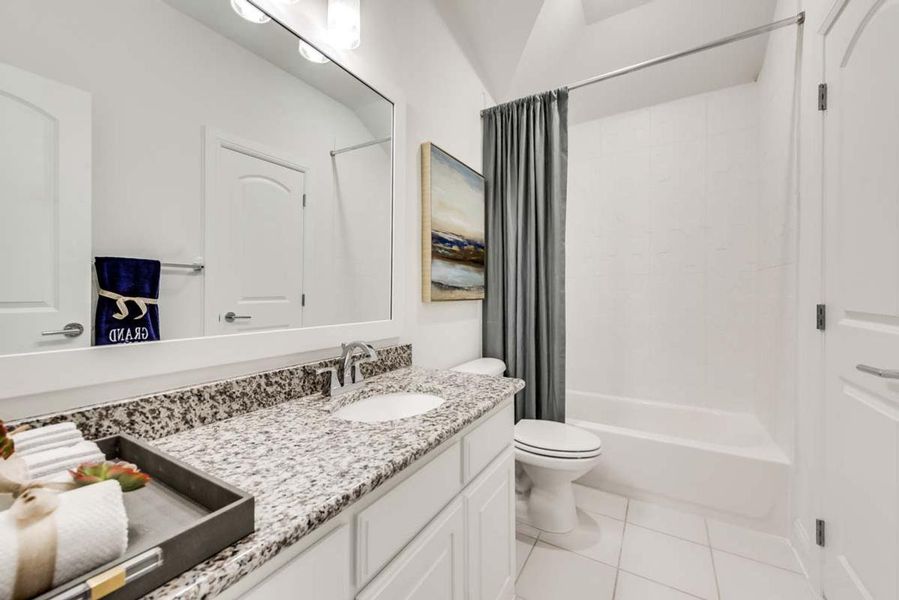 Representative furnished interior of a home built from the Grand Avery II by Grand Homes in Grand Oaks, Celina (Image 29).