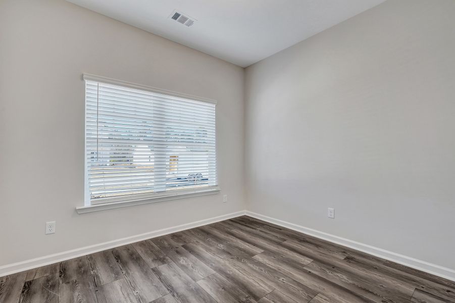 Representative unfurnished interior of a home built from the The Cypress by Smith Family Homes in Heritage at New Riverside, Bluffton (Image 14).