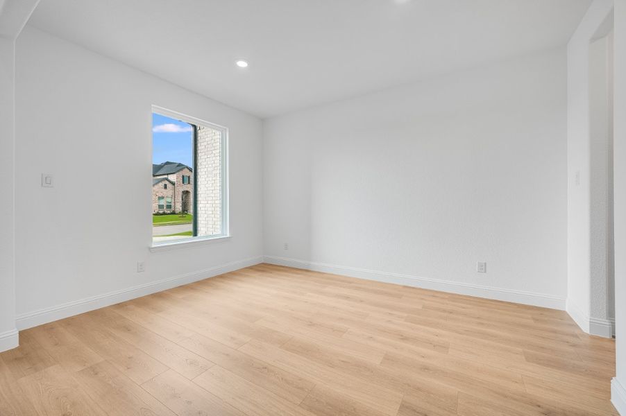Representative unfurnished interior of a home built from the Sapphire by Taylor Morrison in Highland Lakes 60s, McKinney (Image 13).